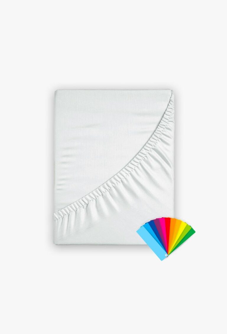 Ein sauber gefaltetes Tamara-R Fixleintuch Selection-FIX Spannbetttuch in Weiß zeigt seinen elastischen Rand, während unten rechts ein Farbfächer in Blau, Rosa, Rot, Gelb, Grün und Orange erscheint.