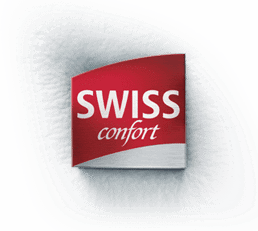 Ein rotes und weißes rechteckiges Logo mit dem Schriftzug SWISS confort in weißer Schrift. Der Hintergrund hat einen sanften weißen Farbverlauf, der ein sauberes und modernes Aussehen verleiht.